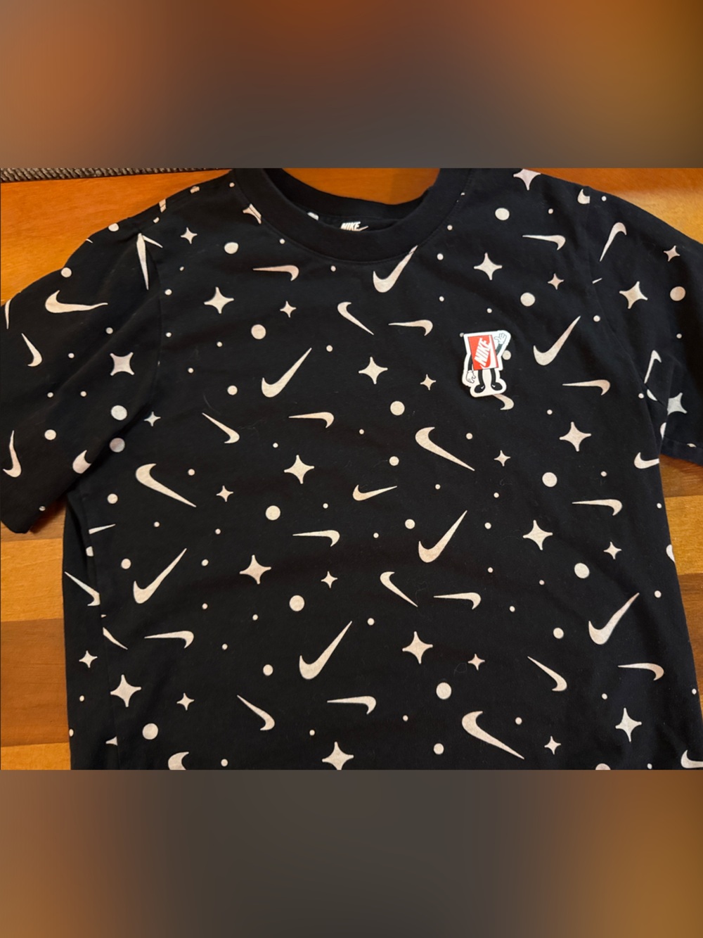 Nike Black Tee with White Swoosh Star Pattern